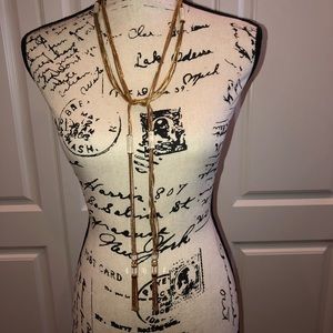 Rachel Zoe gold & white enamel tassel necklace.